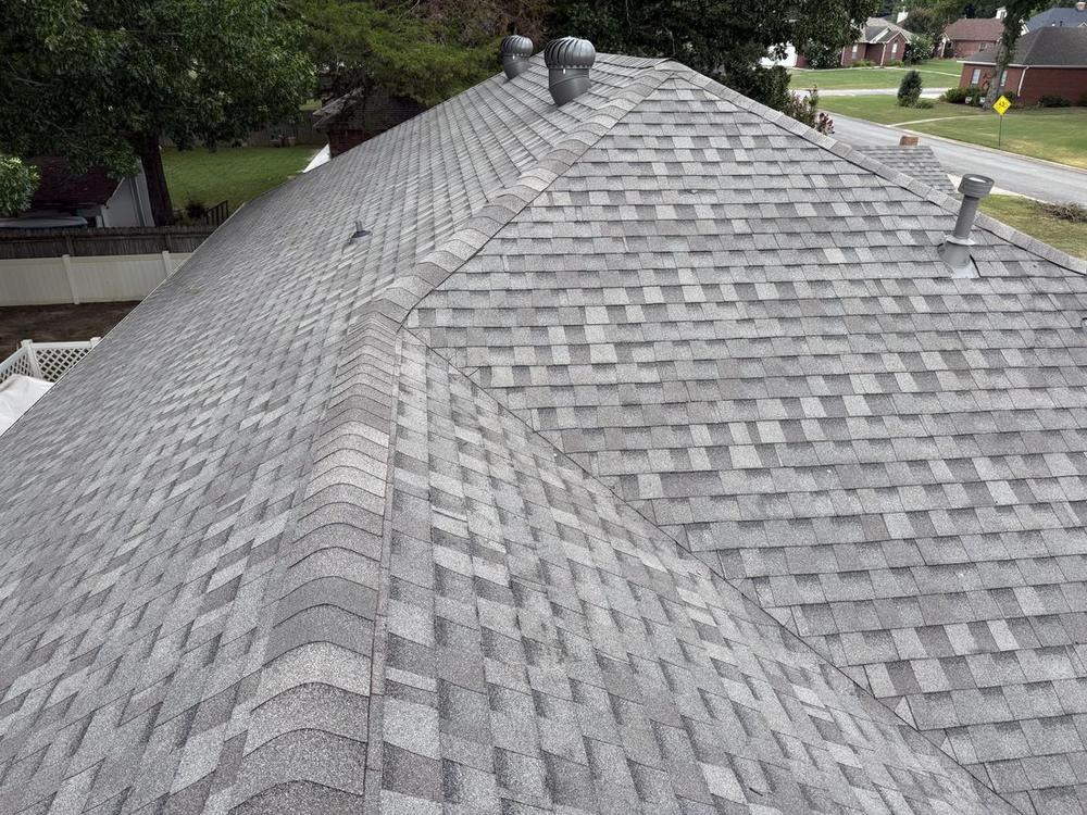 Aerial view of a completed shingle roof installed by Presley Roofing